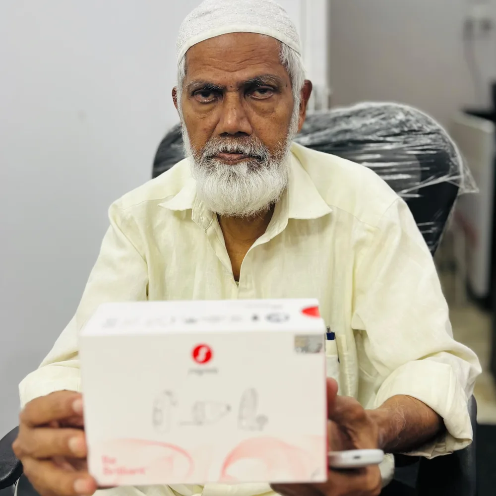Happy hearing aid user